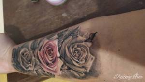 Ostatnie foto przedstawia tatuaż na...