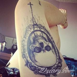 Tatuaże podkreślające nie tylko przywiązanie do religii. Krzyże o różnej formie - od cienkich po potężne; stylizowane na drewno jak i krzyże o metalicznej postaci czasami podkreślone dodatkowym łańcuchem. 