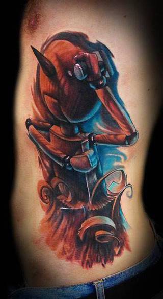 Drewniana kukiełka strugająca samą siebie.