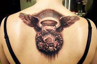 Klepsydra + motyw skrzydeł