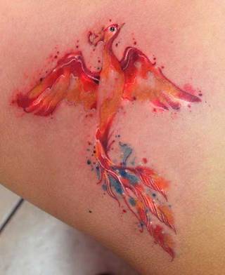 Niczym z popiołów feniks, rozbłysł płomieniem na Twoim ramieniu, znacząc ogniem wszystkie iskry życia