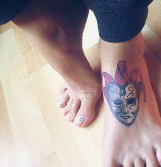 Sad and happy mask with colour